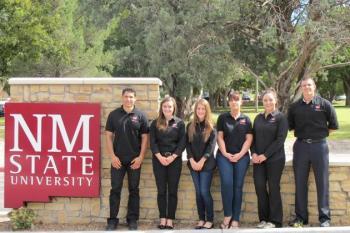 student team by nmsu wall