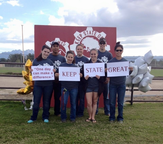 student team holding signs